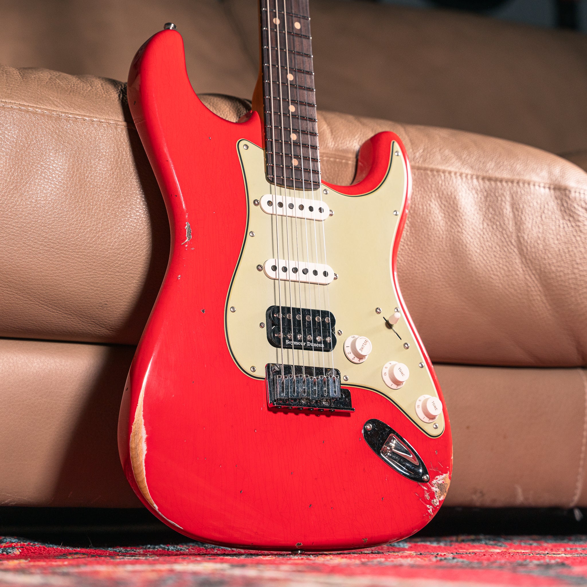 Fender Custom Shop Deluxe Stratocaster Relic in Aged Fiesta Red