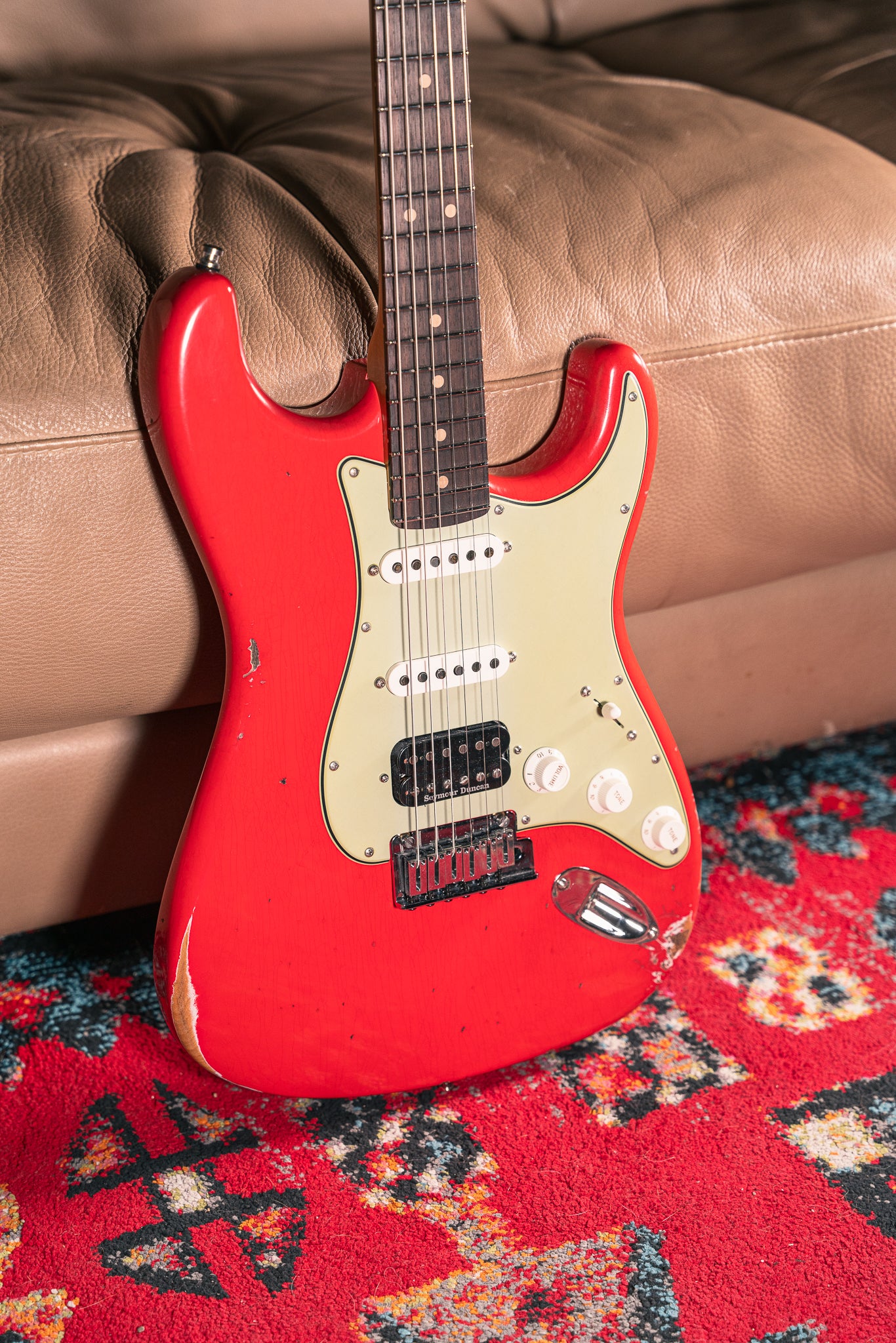 Fender Custom Shop Deluxe Stratocaster Relic in Aged Fiesta Red